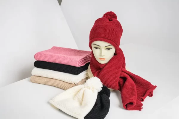 knitted hat and scarf on a stand