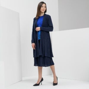 Cardigan Nika is a very attractive long ribbed and free-falling cardigan with a shawl collar. We also recommend a ribbed skirt to wear along with it. It is versatile and is also great in combination with trousers.