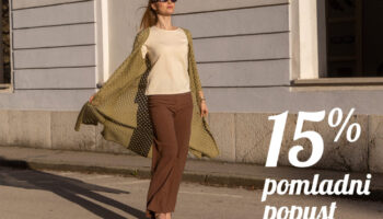 Ženska v elegantni pomladni opravi hodi po ulici. Pletenine Špenko ponujajo 15 % popust s kuponsko kodo POMLAD15. Popust velja ob nakupu nad 50 € do 19. 4.